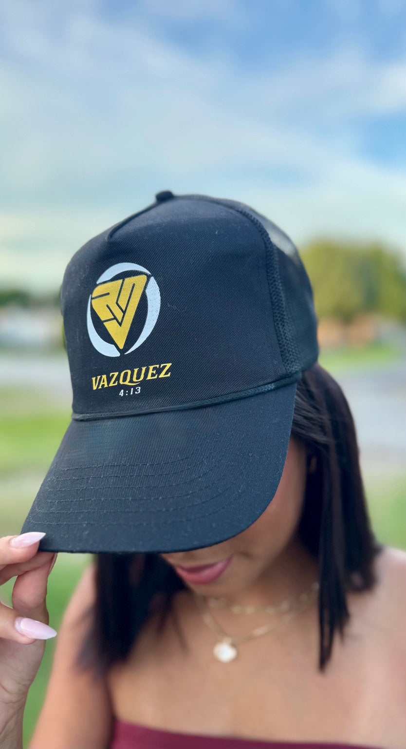 Vázquez 4:13 black trucker hat modeled front view